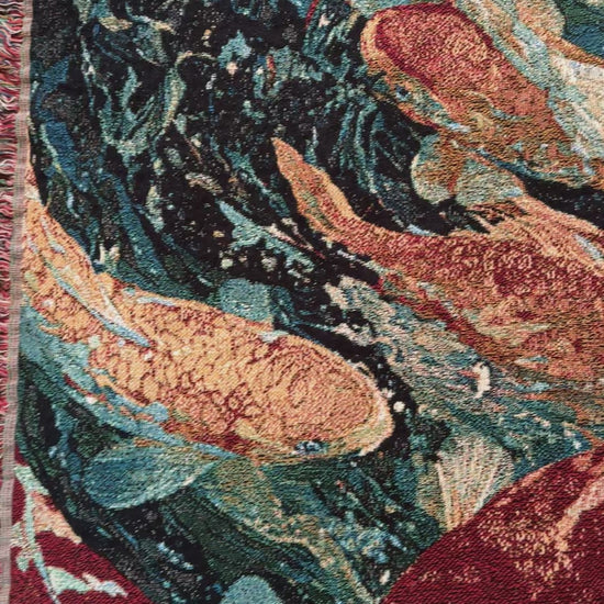 video of a koi fish woven blanket