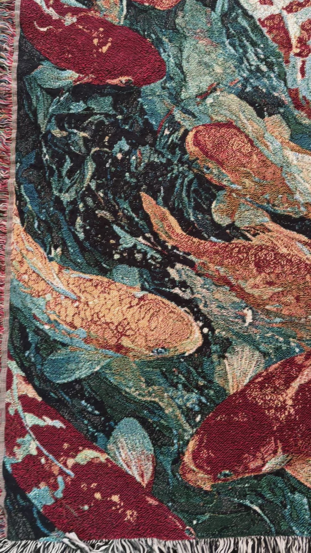 video of a koi fish woven blanket